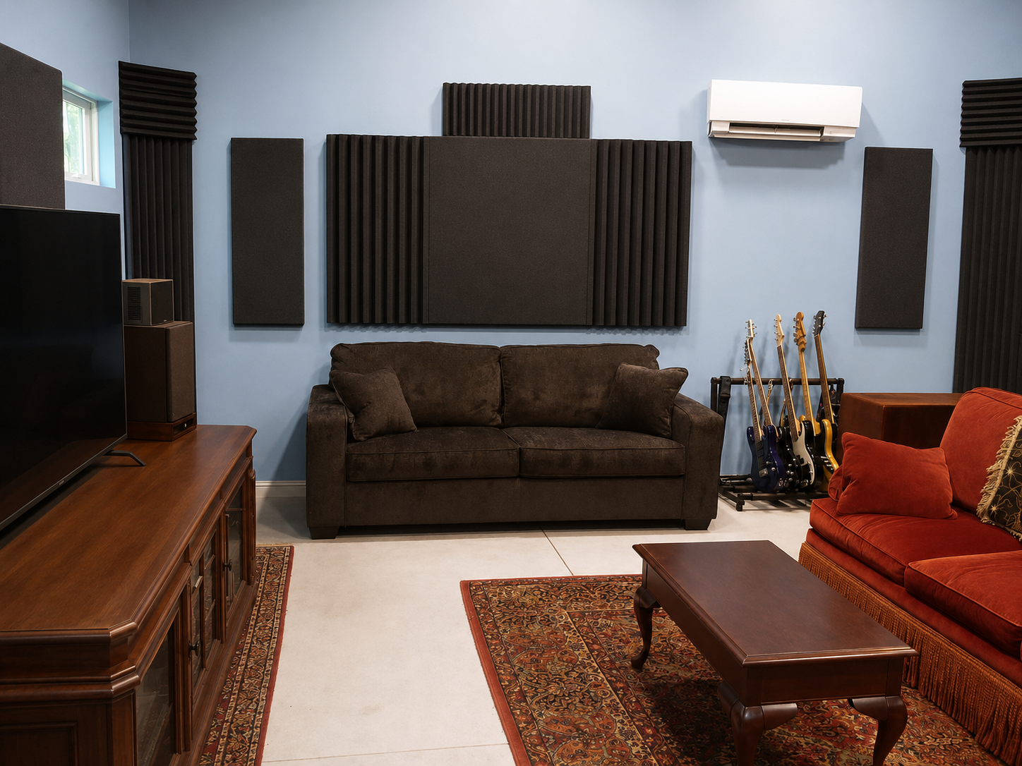 The 214 lounge with a brown couch, guitars on a rack, and acoustic panels on blue walls